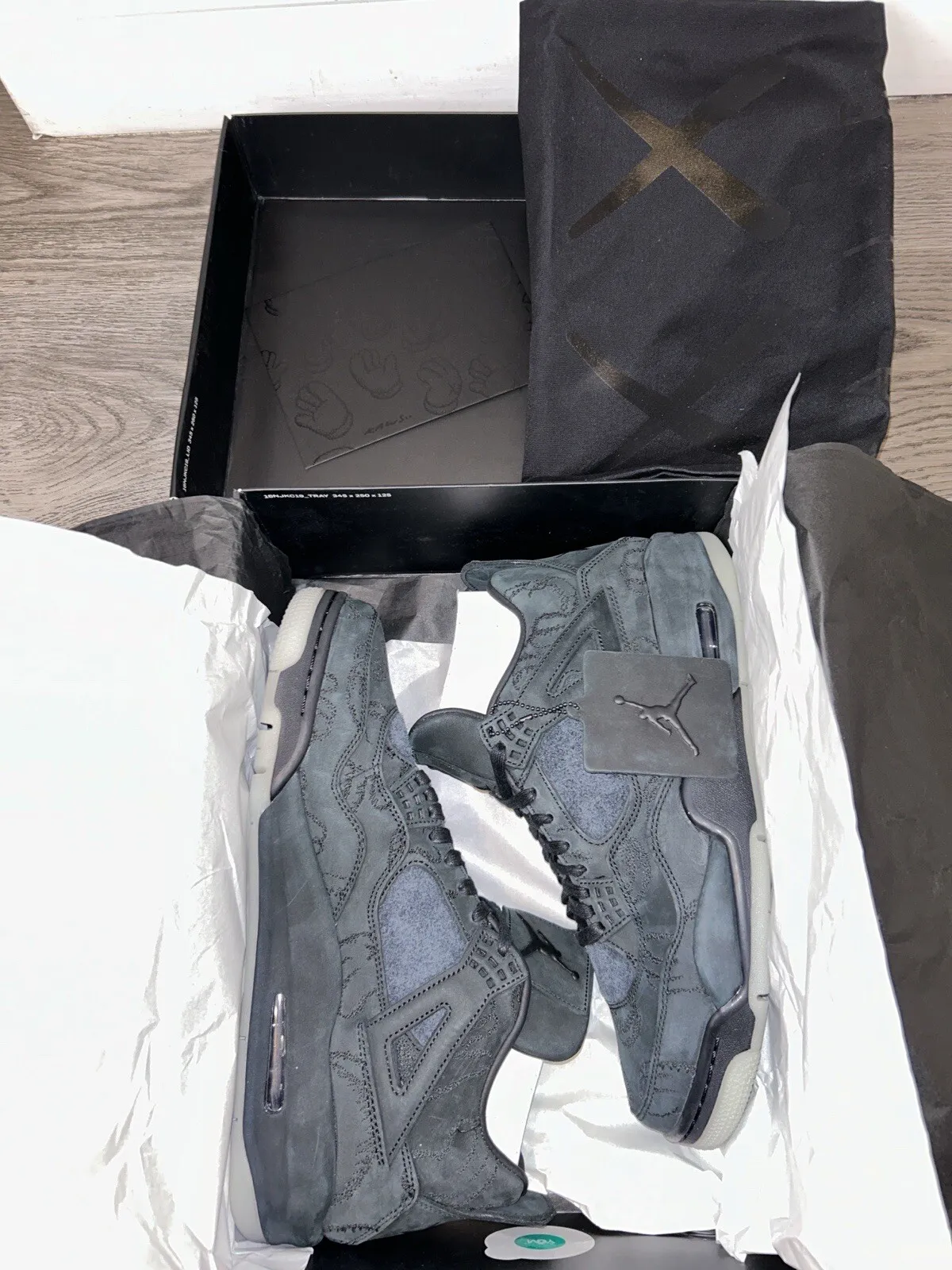 Q4 Batch Air Jordan 4 Retro KAWS Black review Gael Taylor 02