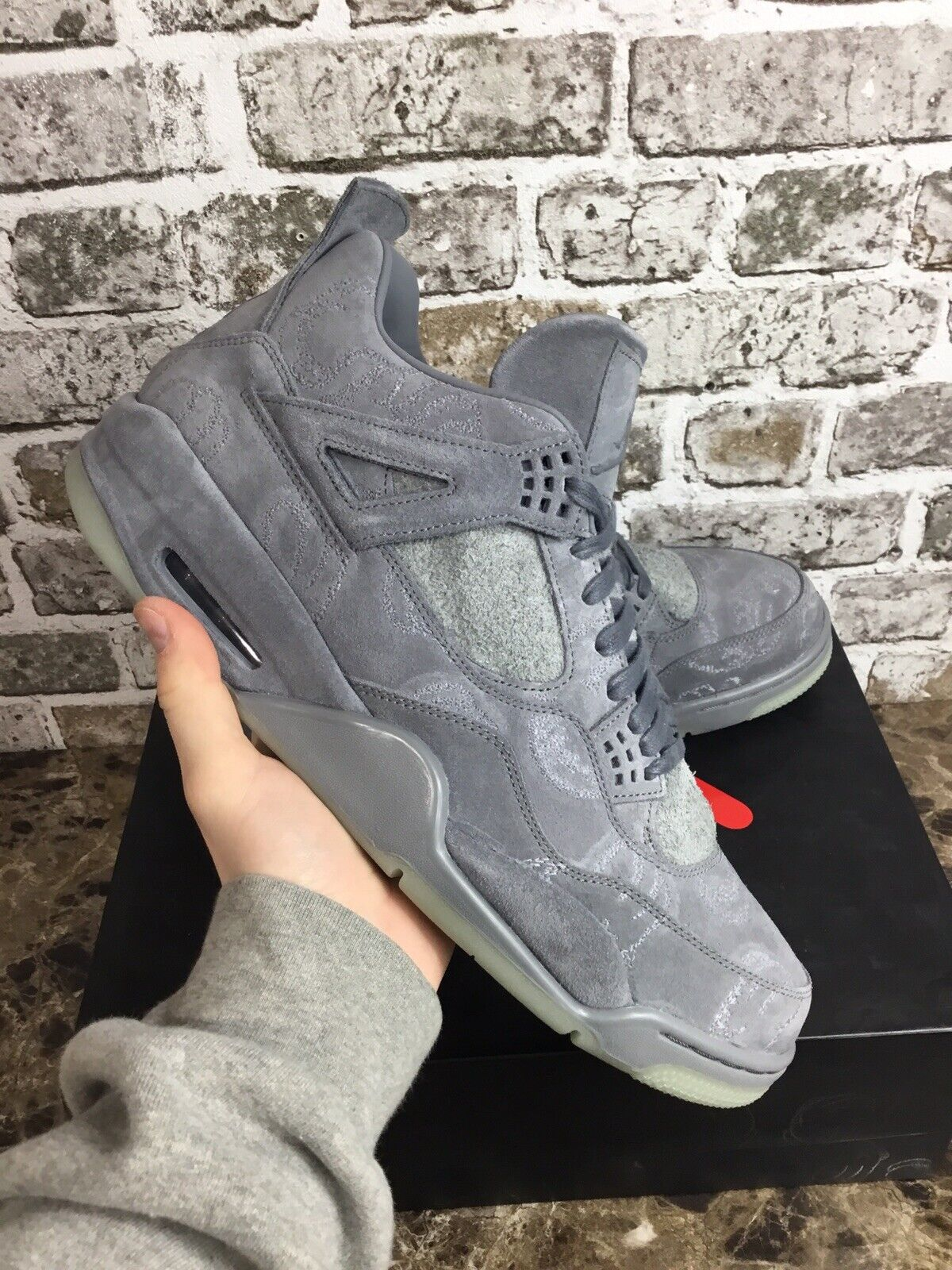 OG Batch KAWS X Air Jordan 4 Retro review Ather 01