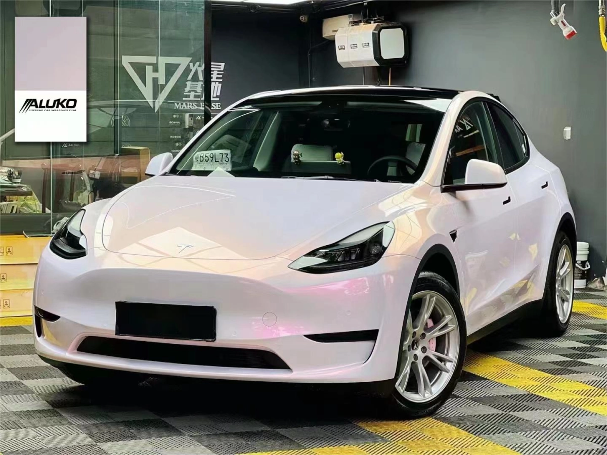 Tesla Model Y Wrap - Gloss White Pink