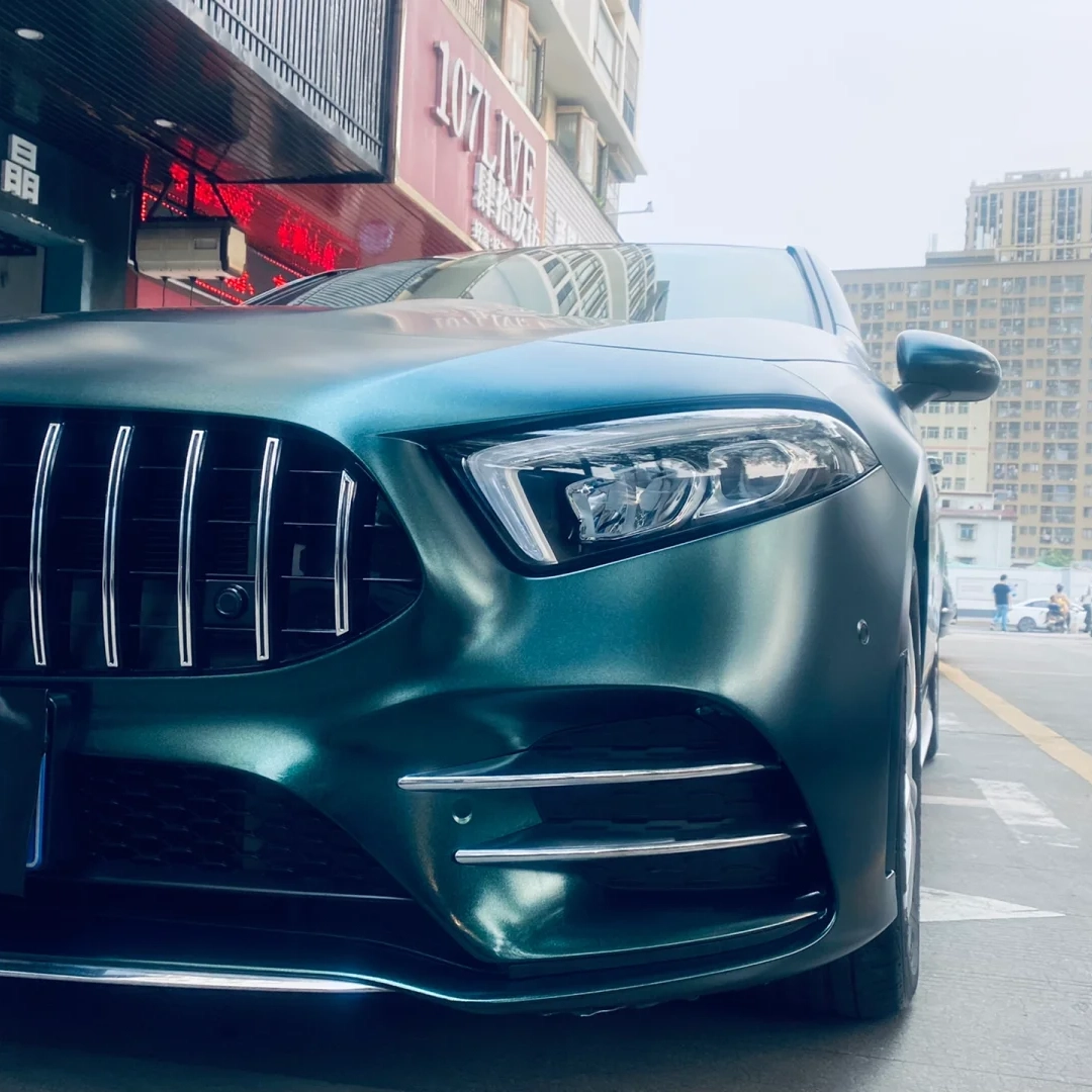 The first thing that captures your attention with the Benz Matte Metallic Heavy Metal Emerald Green Car Vinyl Wrap is its stunning hue. 
