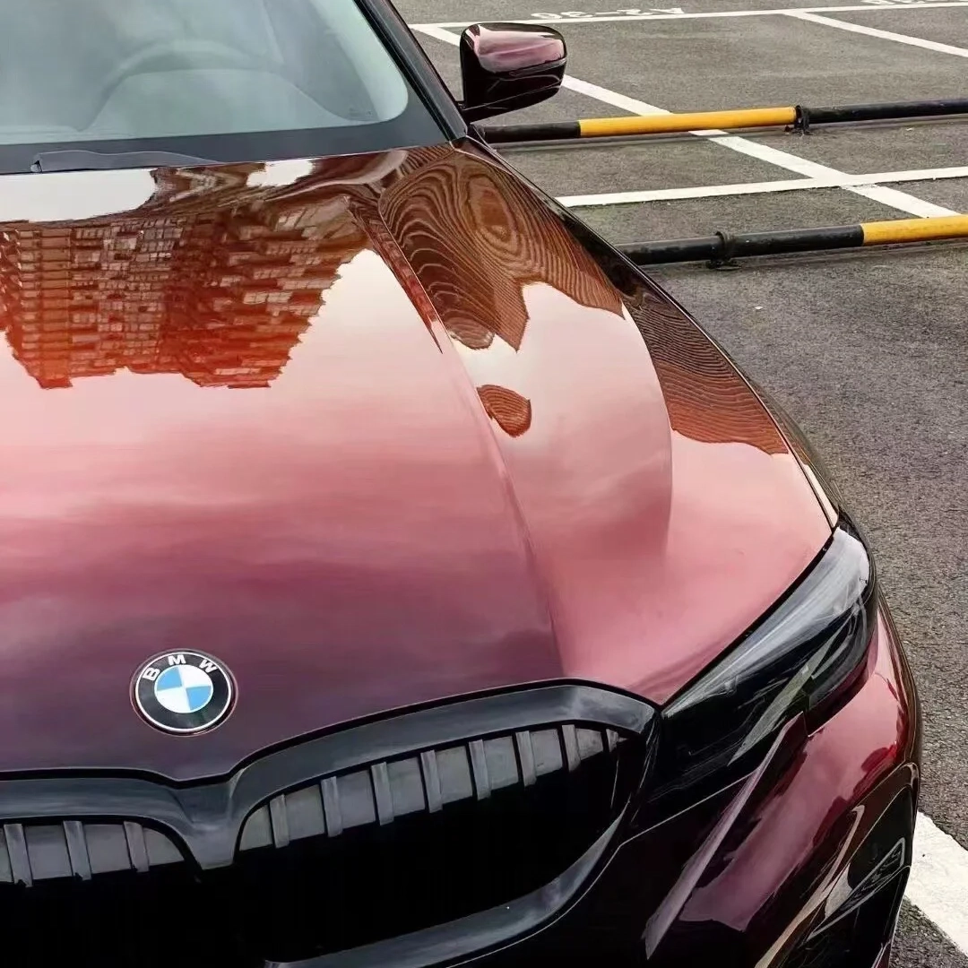 Gloss Shifting Red to Black Car Vinyl Wrap is a special kind of car film that changes color so that the vehicle can show a changing effect from red to black under different light angles or conditions.