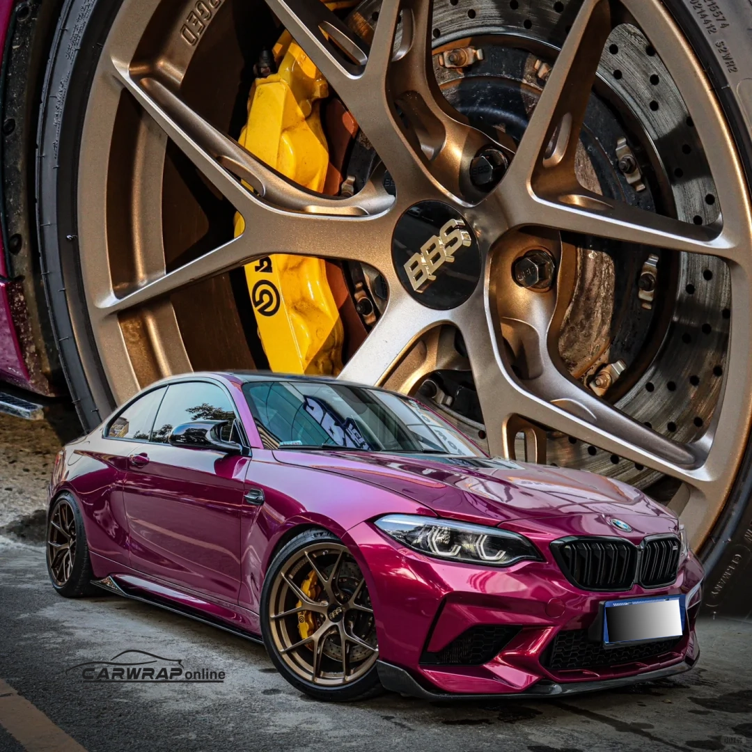 The PET Gloss Glaze Pagoda Red Car Vinyl Wrap offers a striking, high-gloss red finish that transforms the look of your car while providing durable protection against scratches and UV damage.