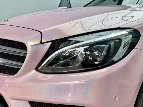 Unlock the code to attract people's attention! Glossy Laser Light Pink Car Vinyl Wrap makes your car look so beautiful that it's against the law--carwraponline.com
