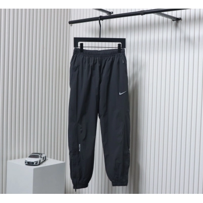 Nike x Drake NOCTA Series Zippered Cuffed Track Pants Black 01