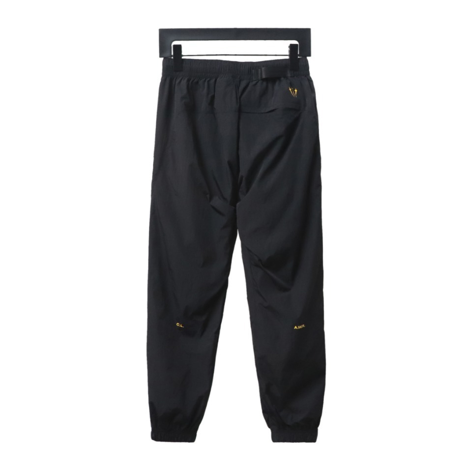 Nike x Drake NOCTA Series Zippered Cuffed Track Pants Black Gold