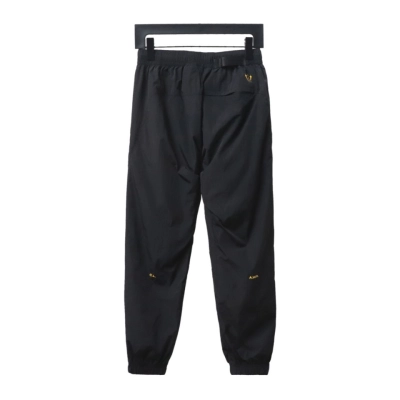 Nike x Drake NOCTA Series Zippered Cuffed Track Pants Black Gold 01