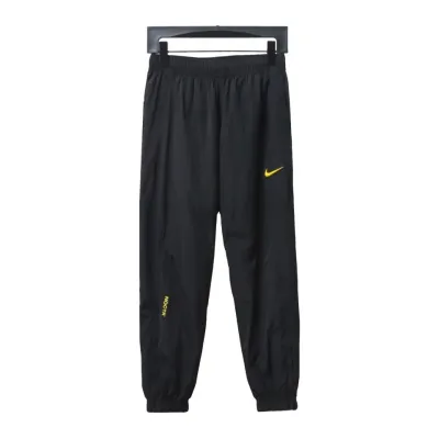Nike x Drake NOCTA Series Zippered Cuffed Track Pants Black Gold 02