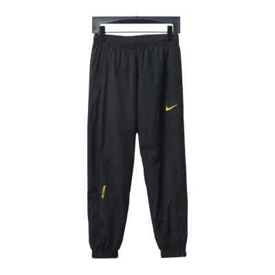 Nike x Drake NOCTA Series Zippered Cuffed Track Pants Black Gold 02