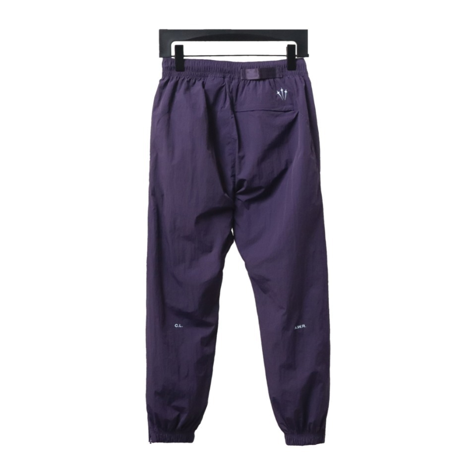 Nike x Drake NOCTA Series Zippered Cuffed Track Pants Purple