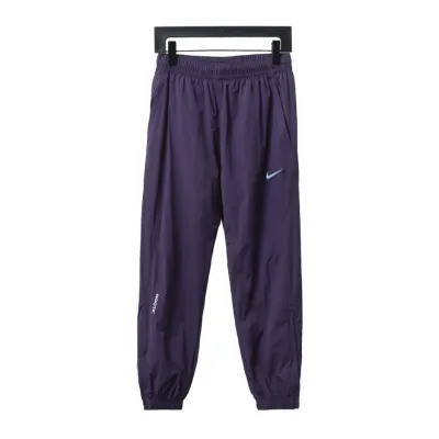 Nike x Drake NOCTA Series Zippered Cuffed Track Pants Purple 01