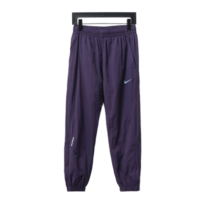 Nike x Drake NOCTA Series Zippered Cuffed Track Pants Purple 01