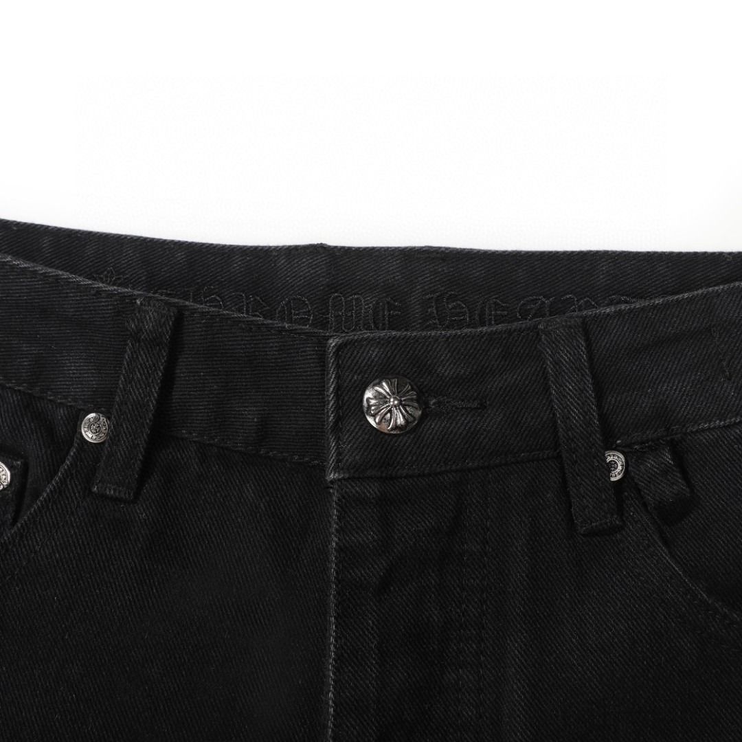 Chrome Hearts black denim jeans with pink and checkered cross patches
