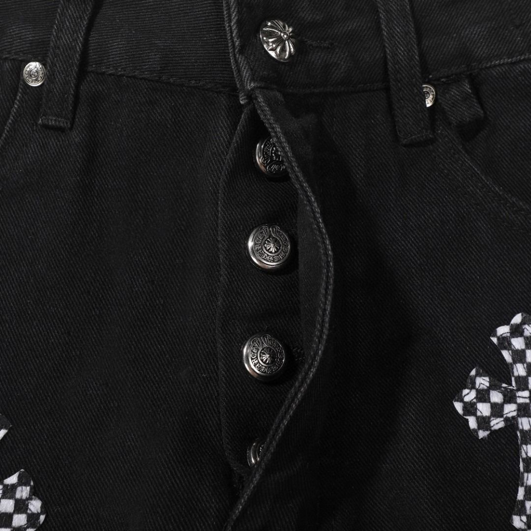 Chrome Hearts black denim jeans with pink and checkered cross patches