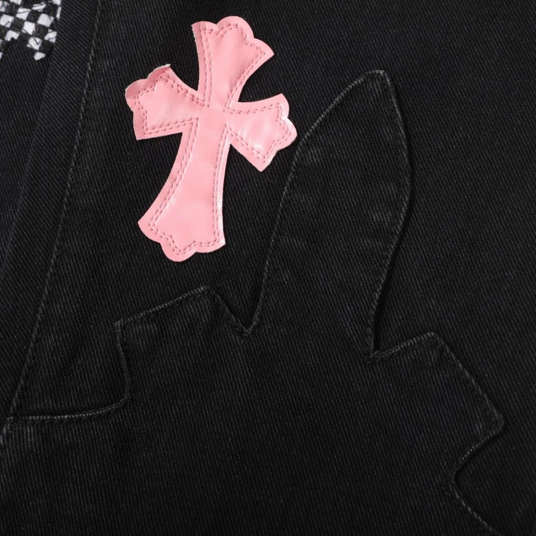 Chrome Hearts black denim jeans with pink and checkered cross patches