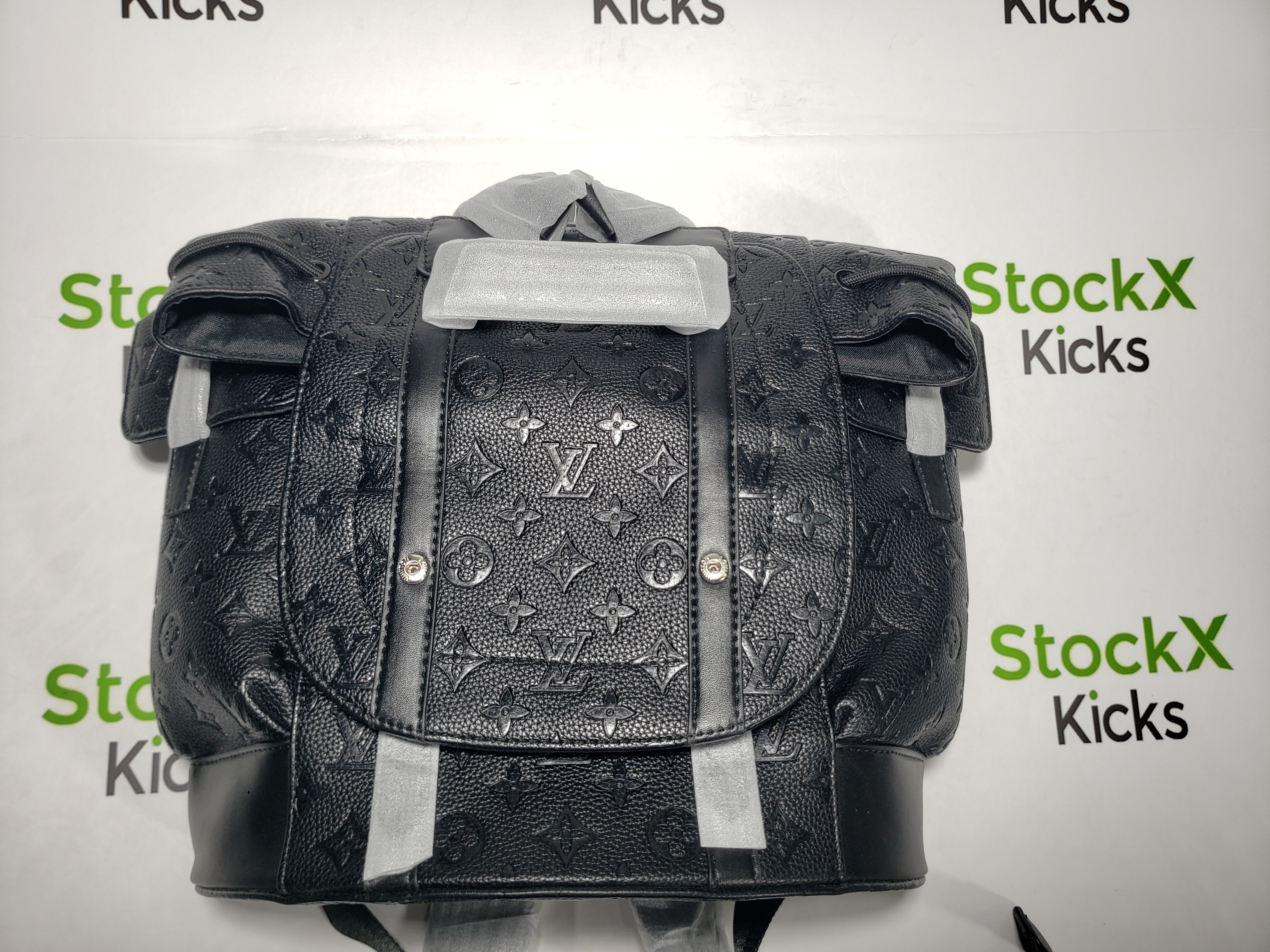 Louis Vuitton Christopher Monogram Empreinte Black CK 420698480 review 0