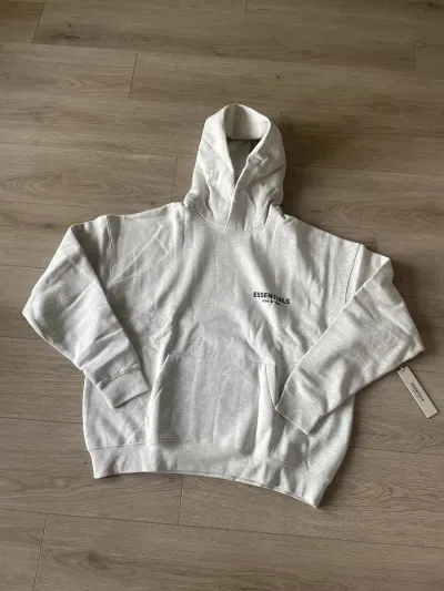 Fear of God Essentials Hoodie Light Oatmeal 192BT212112F review Caren Atkins