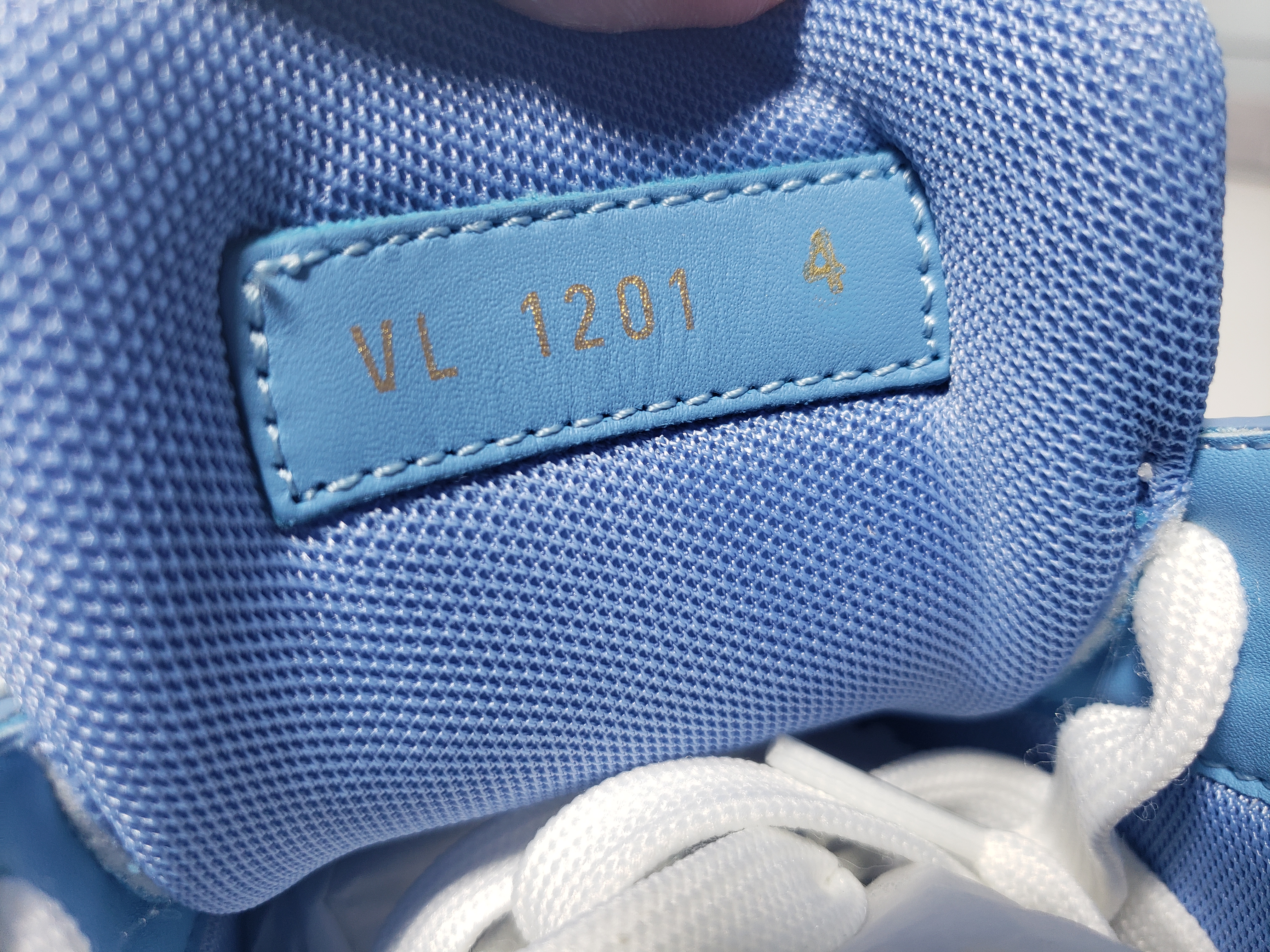 Louis Vuitton Trainer Blue Embossed Monogram 1AARFG review stockxkicks 03