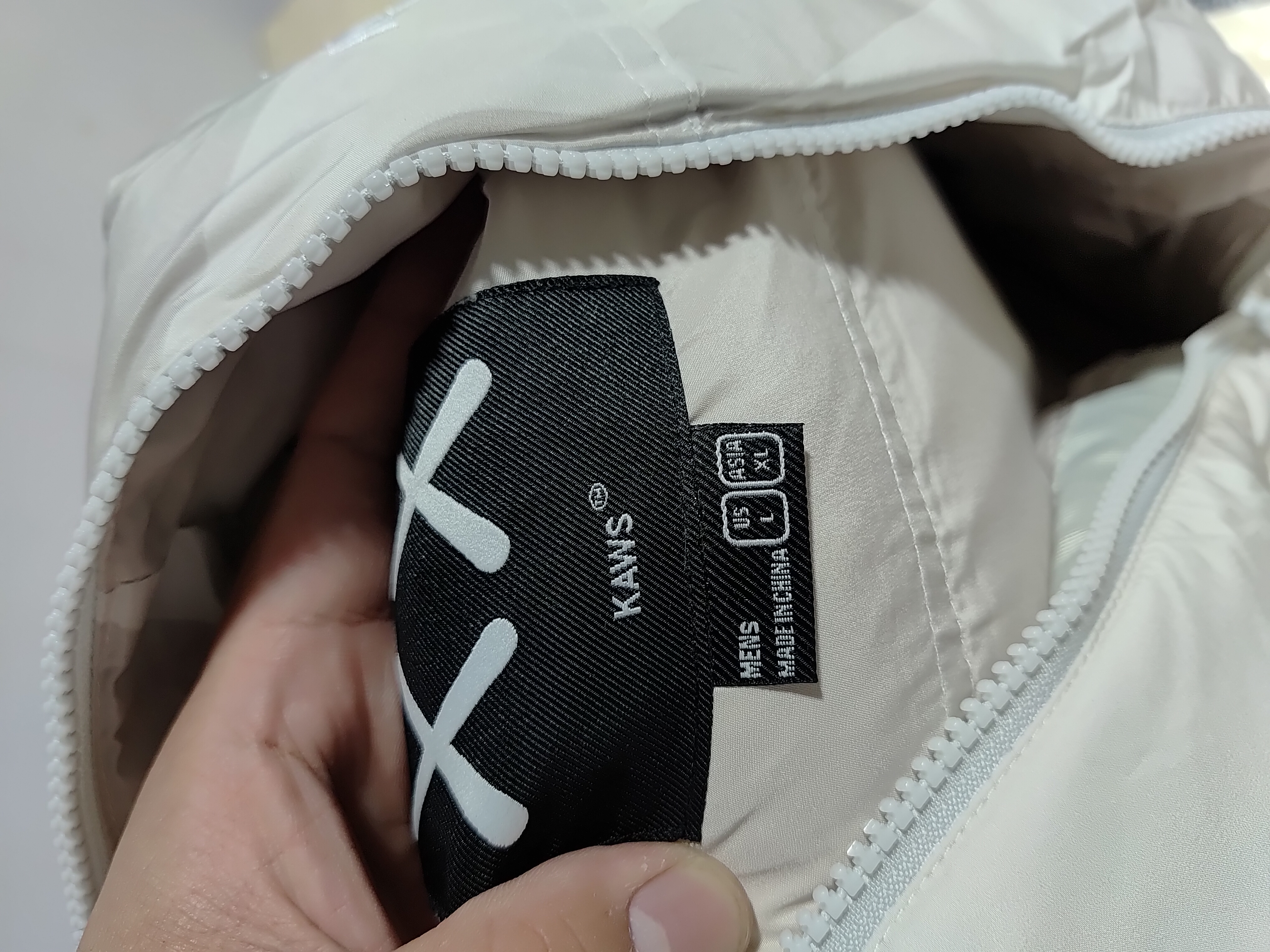 The North Face x Kaws Splicing White And XX white Down Jacket review Stockxkicks 00