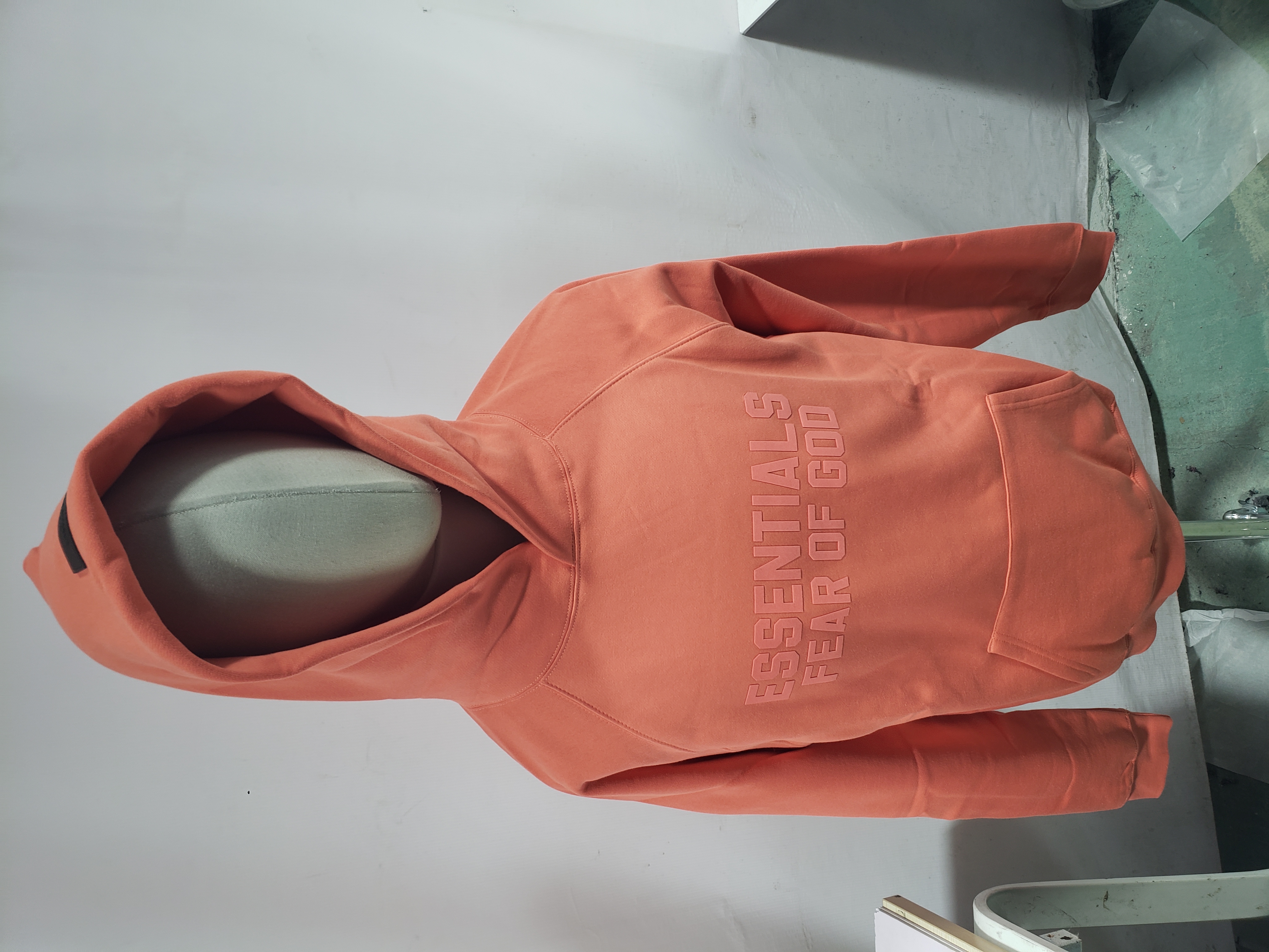 Fear of God Essentials Hoodie 'Coral' review 1