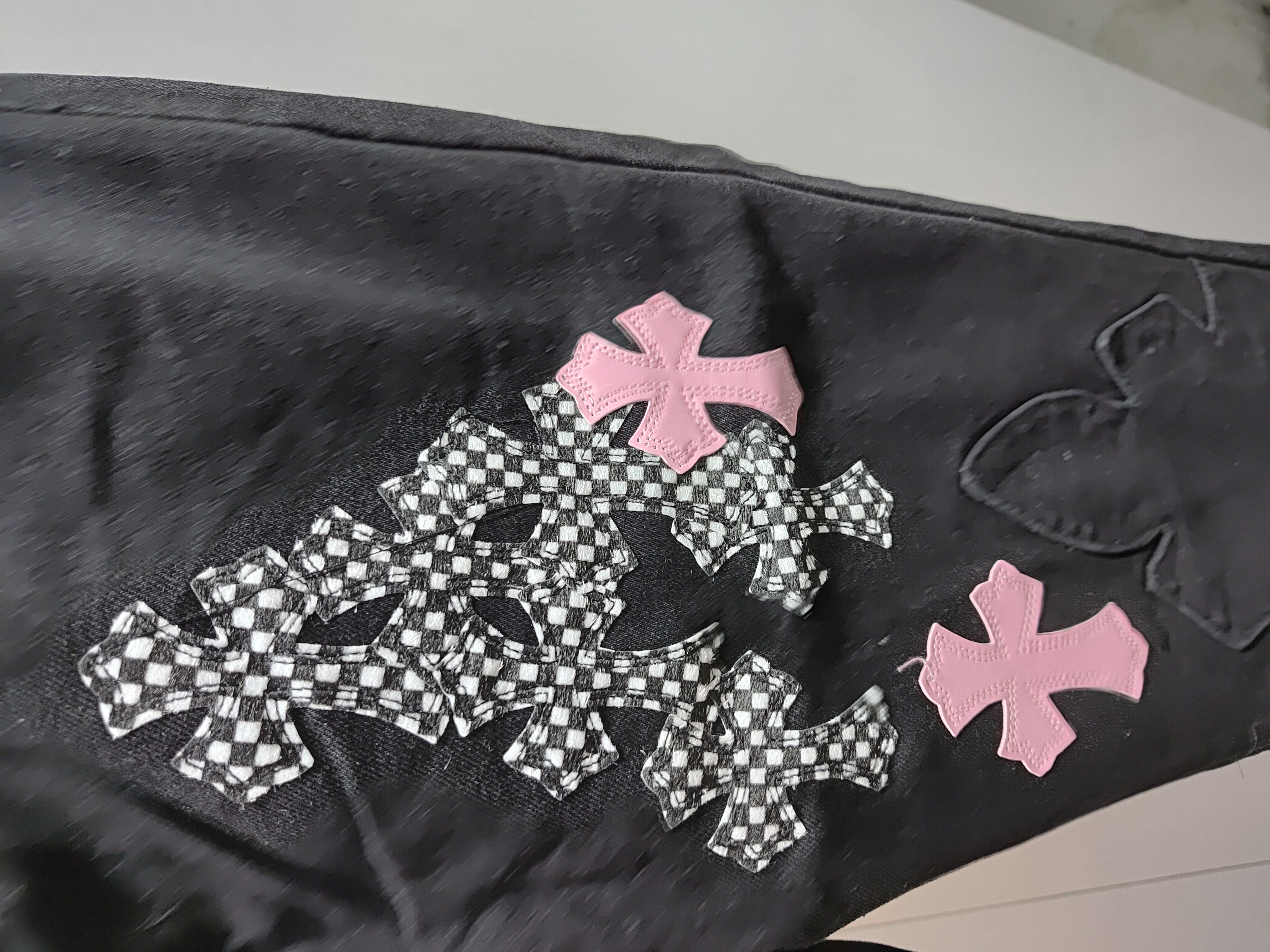 Chrome Hearts black denim jeans with pink and checkered cross patches review StockxKicks 01