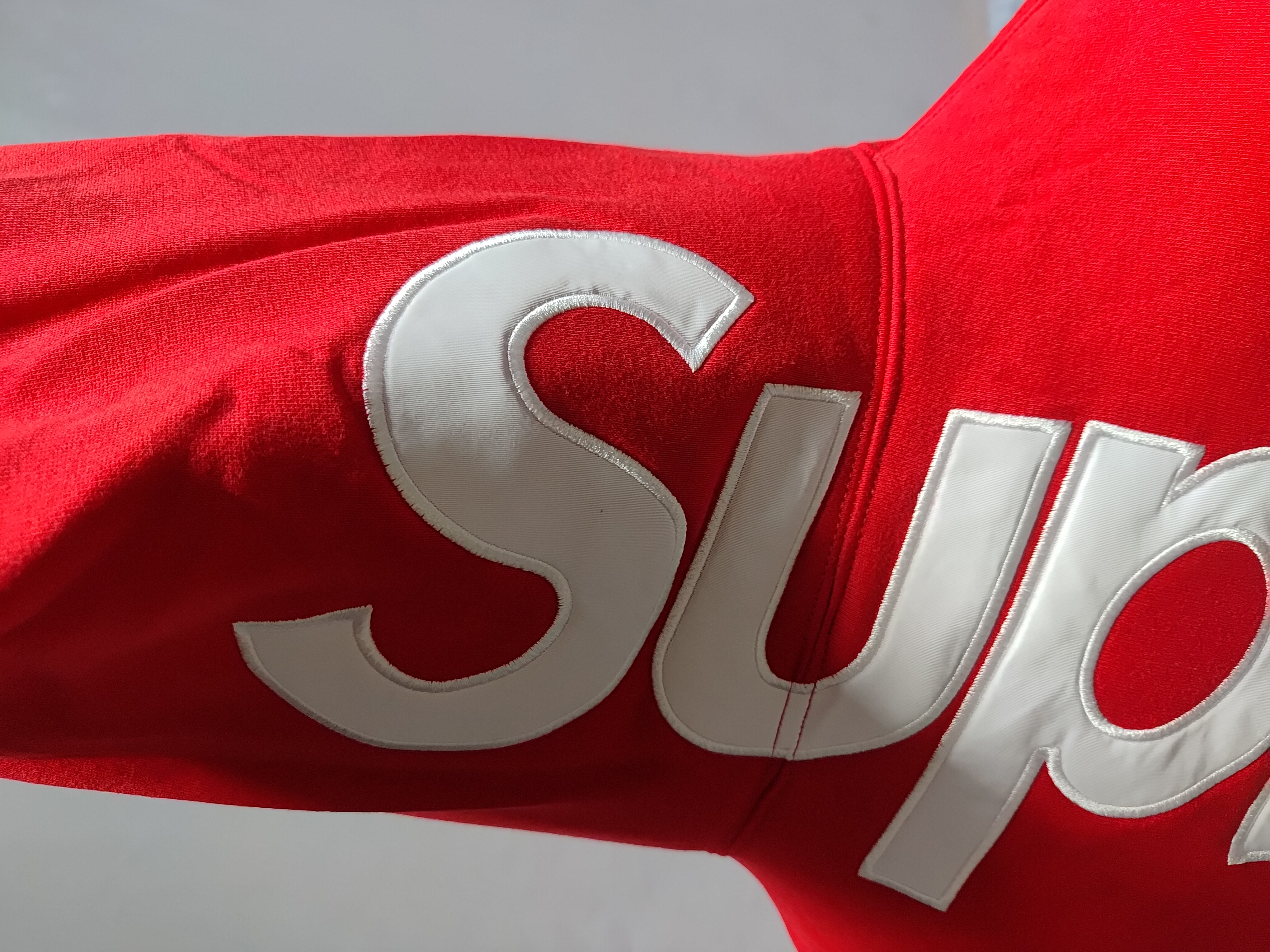 Supreme Satin Appliqué Hooded Sweatshirt Red review StockxKicks 03