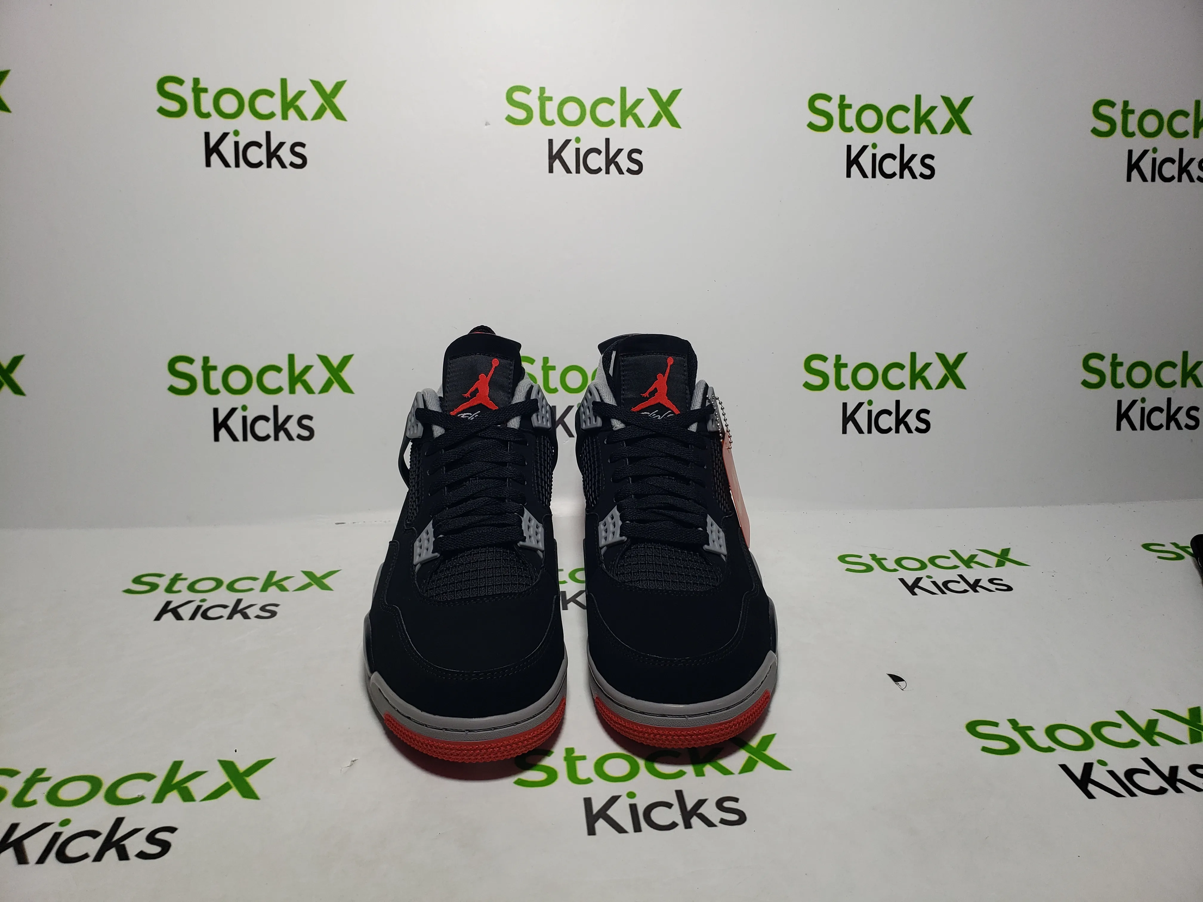 QC photo of PK God Batch Air Jordan 4 Retro Bred 308497-060 replica sneakers from StockX Kicks, showing perfect Jordan 4 reps pre-shipping