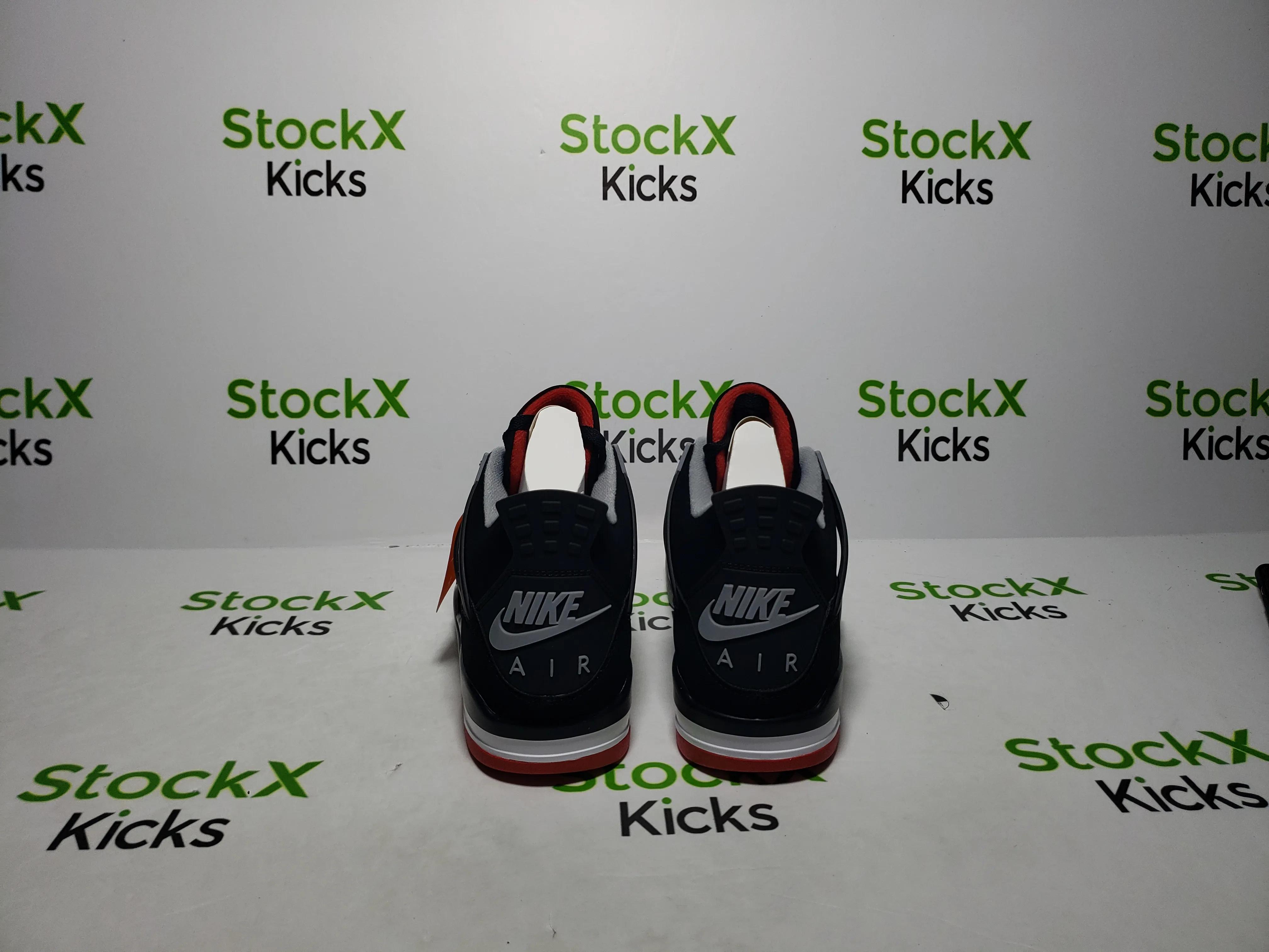 QC photo of PK God Batch Air Jordan 4 Retro Bred 308497-060 replica sneakers from StockX Kicks, showing perfect Jordan 4 reps pre-shipping