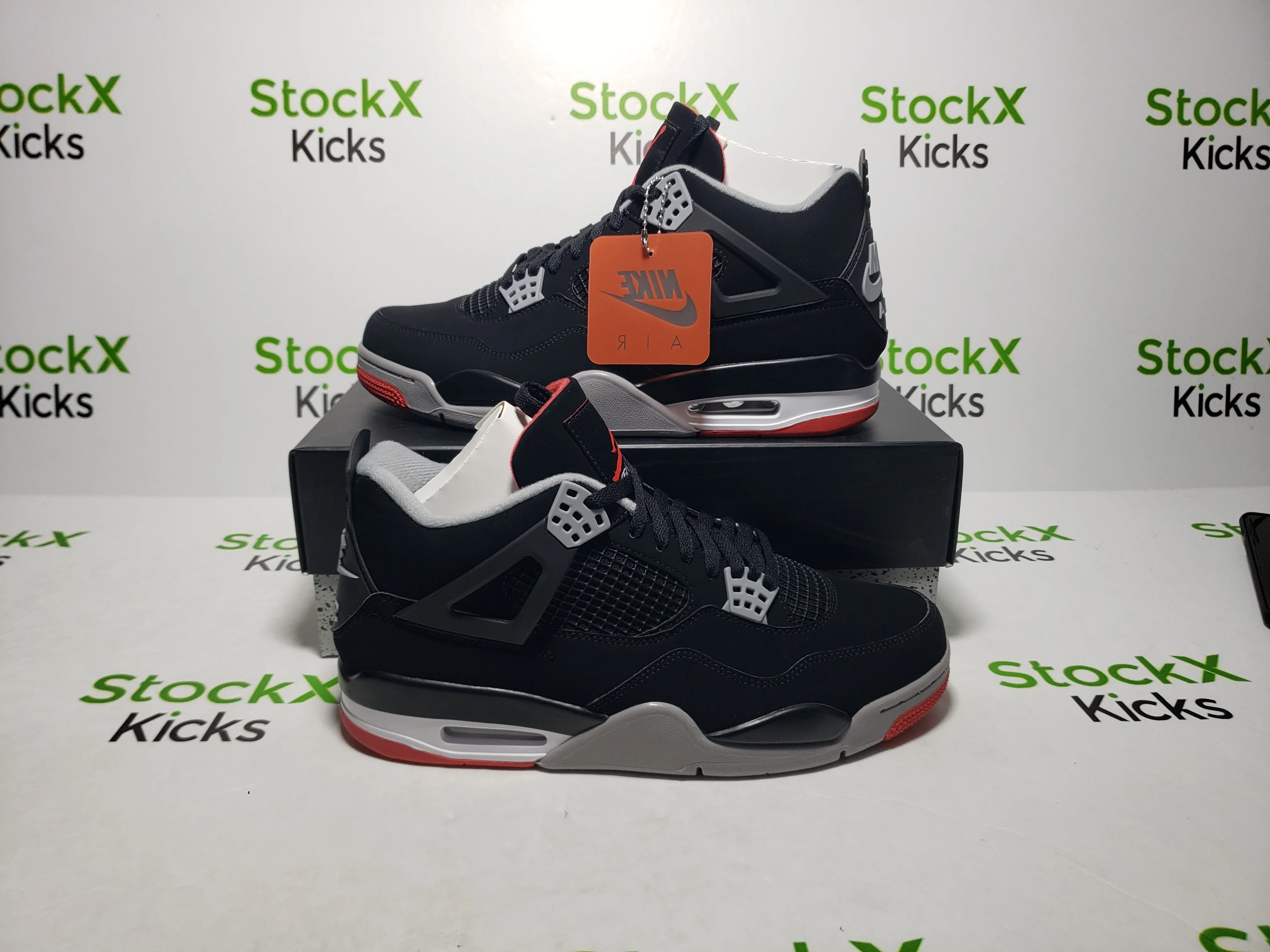 QC photo of PK God Batch Air Jordan 4 Retro Bred 308497-060 replica sneakers from StockX Kicks, showing perfect Jordan 4 reps pre-shipping