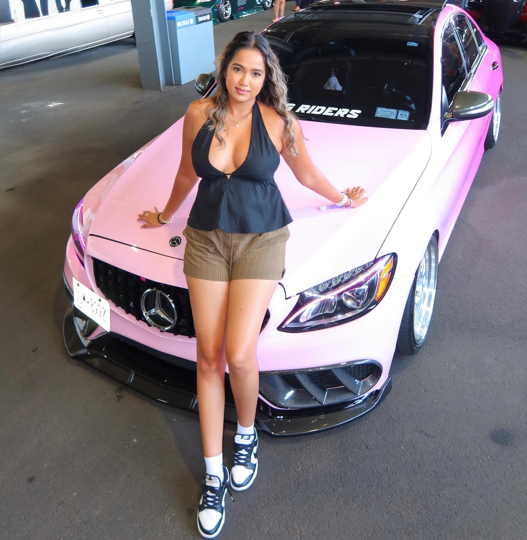 Pink gradient vinyl car wrap installed on vehicle
