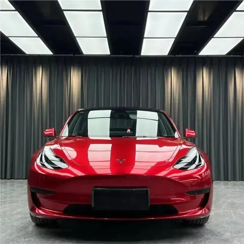 Unleash Bold Elegance: Tesla in Gloss Metallic Vampire Red Car Vinyl Wrap