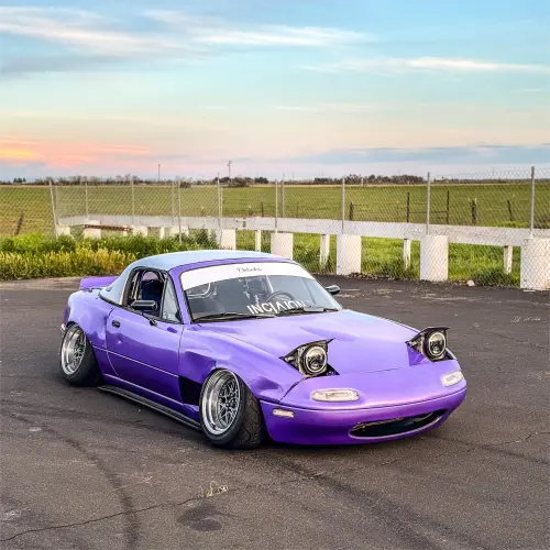 Transform Your Ride with Gloss Metallic Rainbow Laser Purple Car Vinyl Wrap