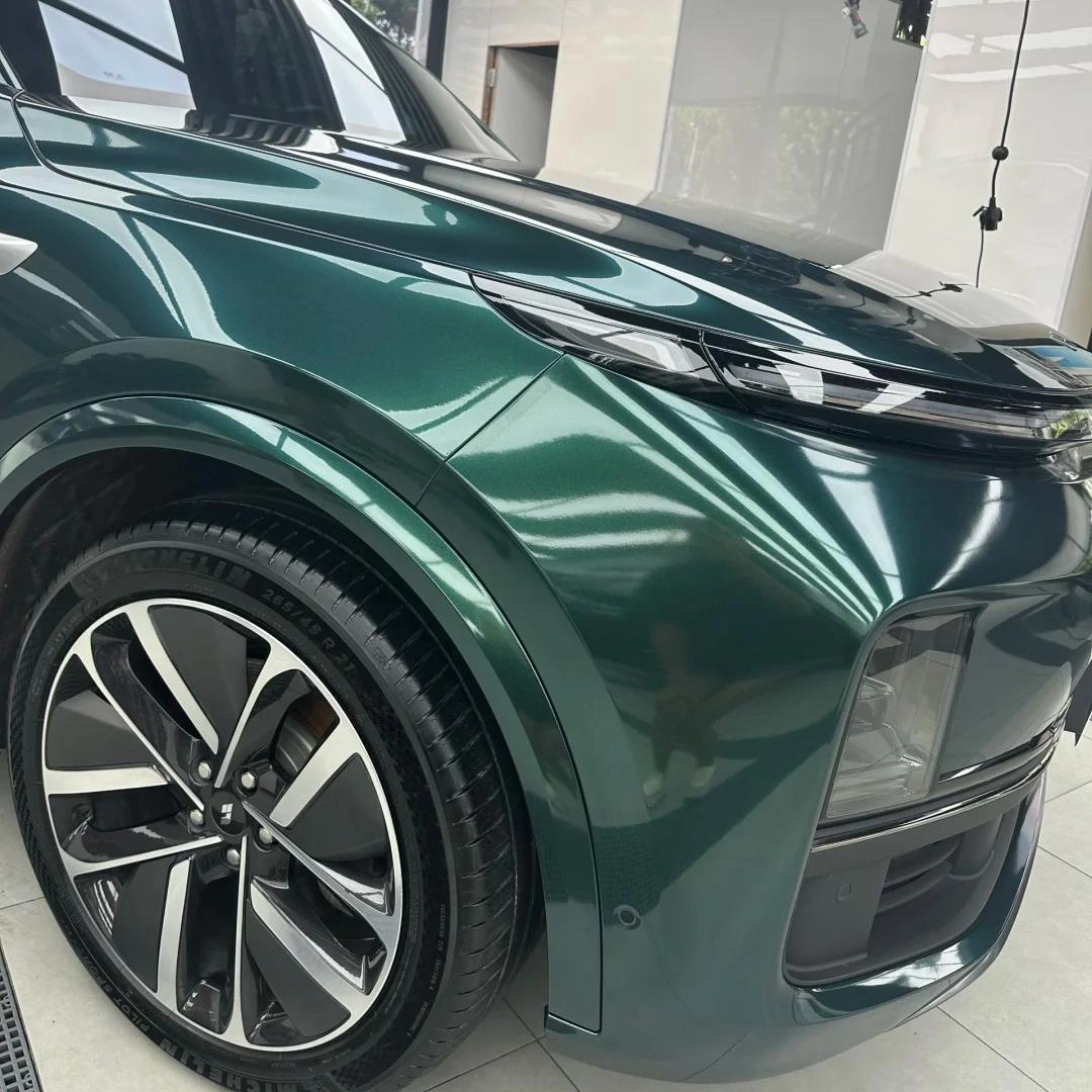 Exploring the Gloss Metallic Ideal Dark Green Car Wrap