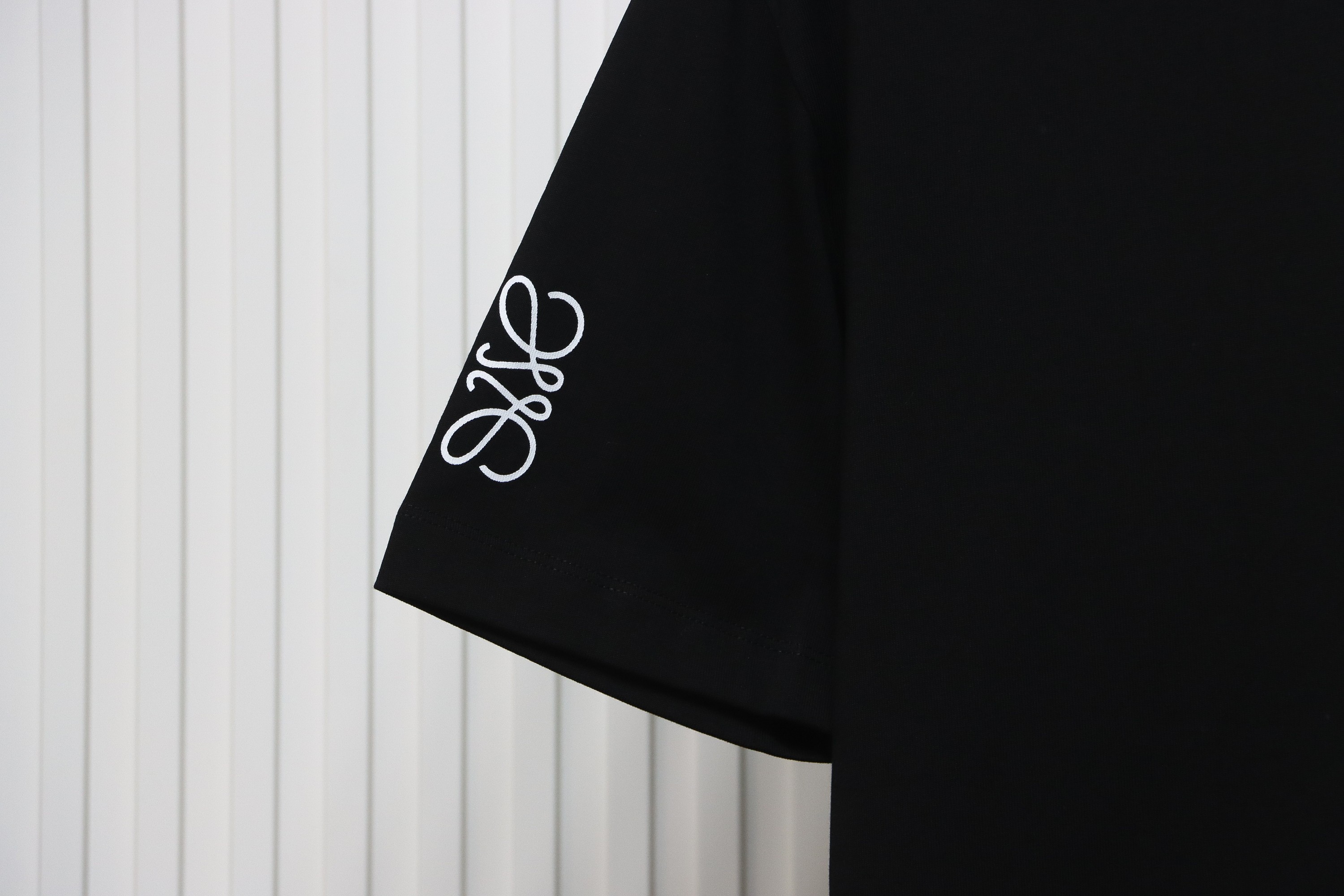 EM Sneakers Loewe T-shirt 24ss Ink Splash Logo Print Black