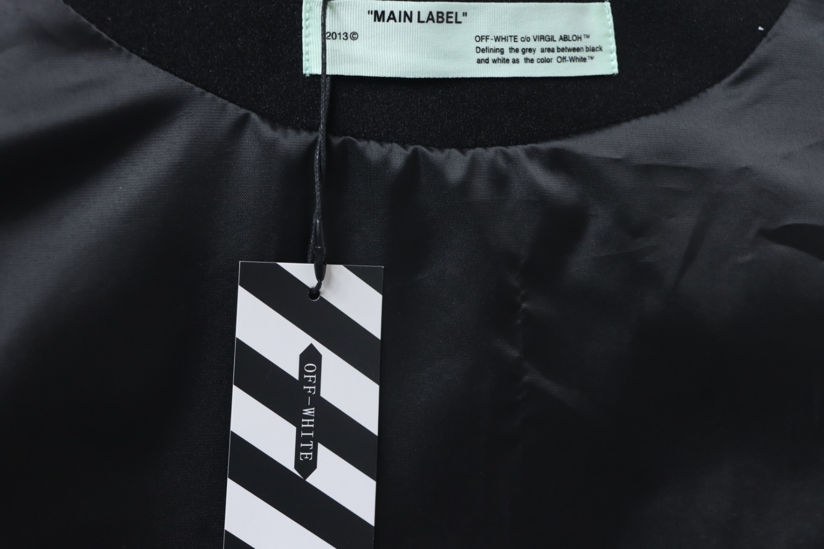 EM Sneakers Off-White Leather Sleeve Five-Pointed Star Baseball Jacket Black and White