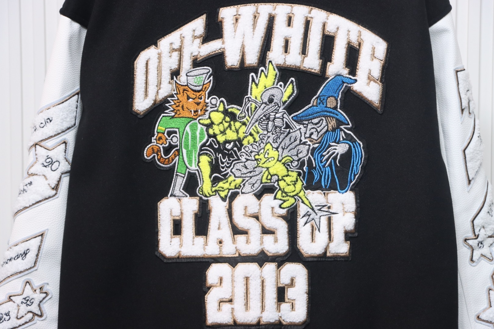 EM Sneakers Off-White Leather Sleeve Five-Pointed Star Baseball Jacket Black and White