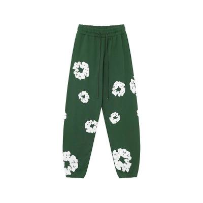 EM Sneakers Denim Tears The Cotton Wreath Sweatpants Green 01