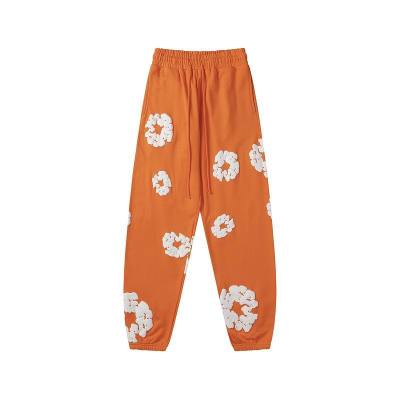 EM Sneakers Denim Tears The Cotton Wreath Sweatpants Orange 01