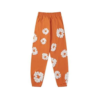 EM Sneakers Denim Tears The Cotton Wreath Sweatpants Orange 02