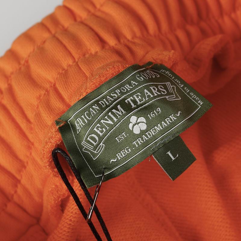 EM Sneakers Denim Tears The Cotton Wreath Sweatpants Orange