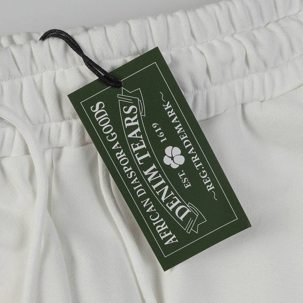 EM Sneakers Denim Tears The Cotton Wreath Sweatpants White