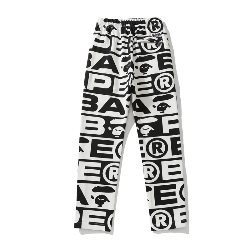EM Sneakers Bape FW23 Full-print Letter Series Shark Loose Version Trousers and Sweatpants White & Green & Red