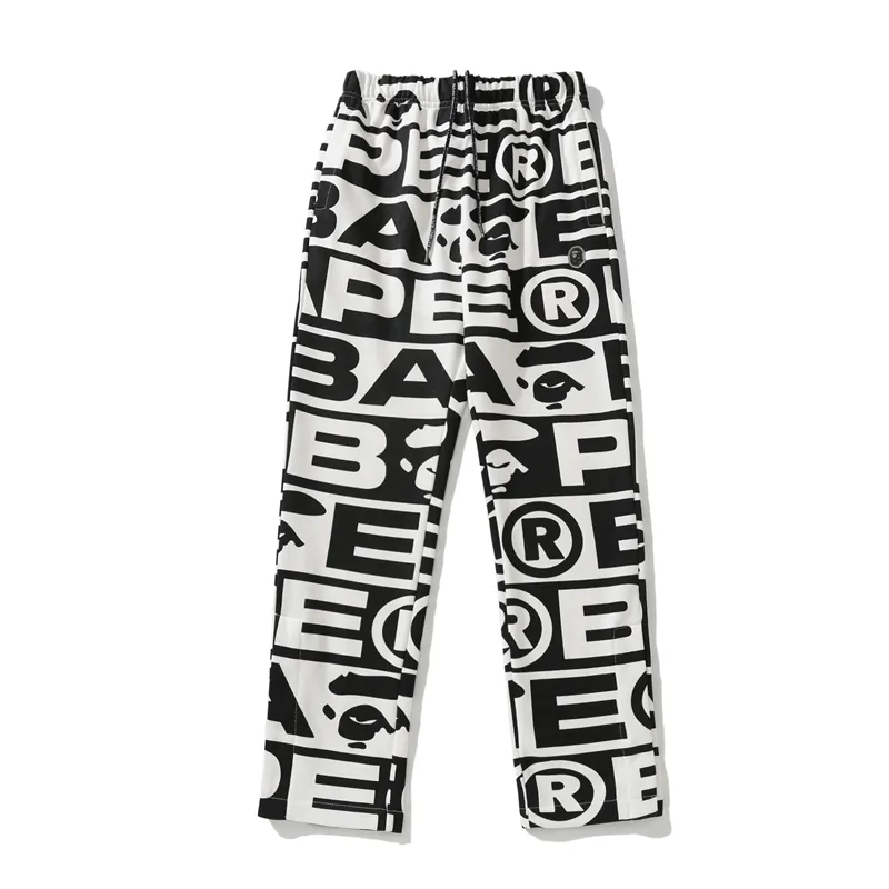 EM Sneakers Bape FW23 Full-print Letter Series Shark Loose Version Trousers and Sweatpants White & Green & Red