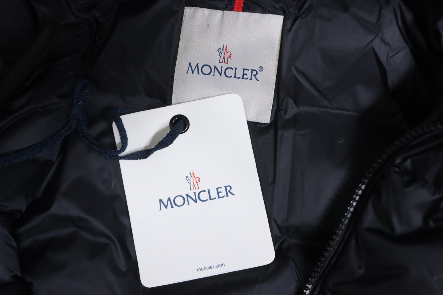 EM Sneakers Moncler Stellaire Hooded Black and White Colorblock Down Jacket