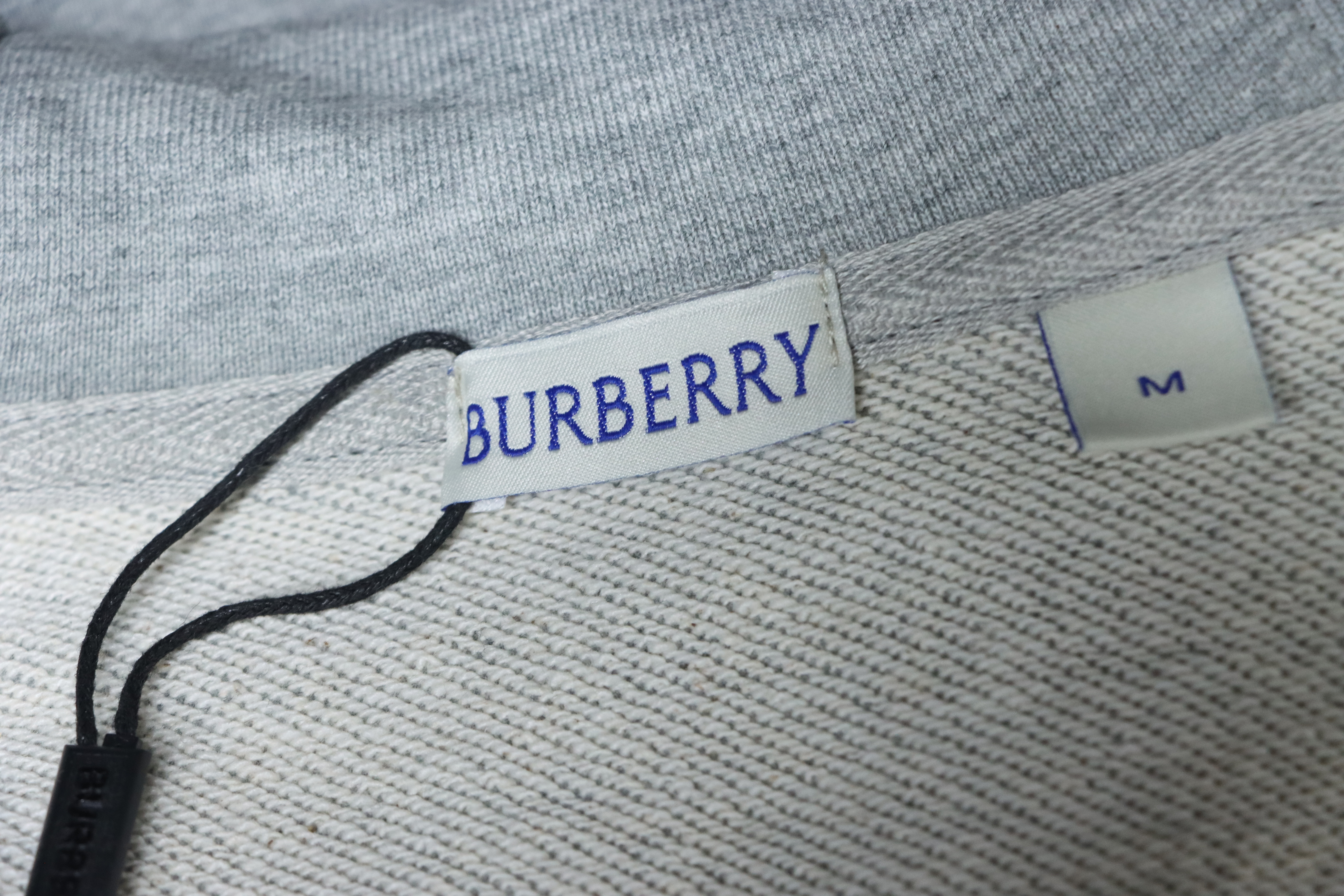 EM Sneakers Burberry Grey Zip-up Hoodie with Side Quilting Pattern