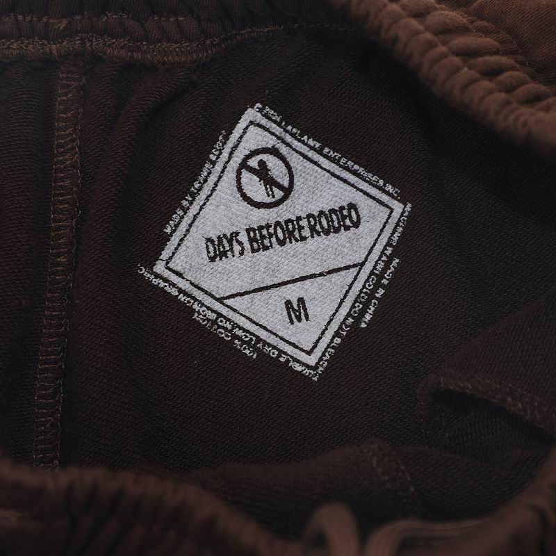 EM Sneakers Cactus Jack by Travis Scott x Sp5der Days Before Rodeo Shorts Brown