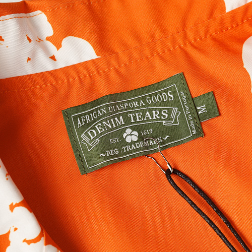 EM Sneakers Denim Tears White Cotton Wreath Short-Sleeve Shirt & Shorts Sets #386-8203 Orange