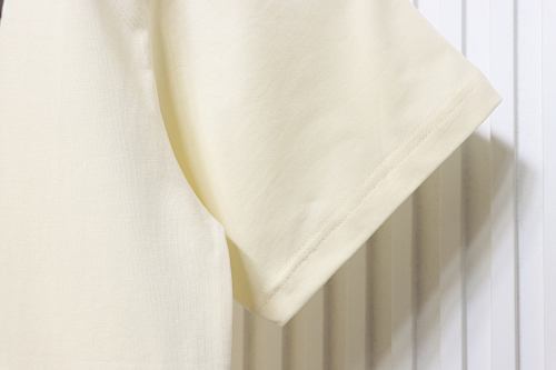 EM Sneakers Gucci Cartoon Cat Reading Print T-Shirt Apricot