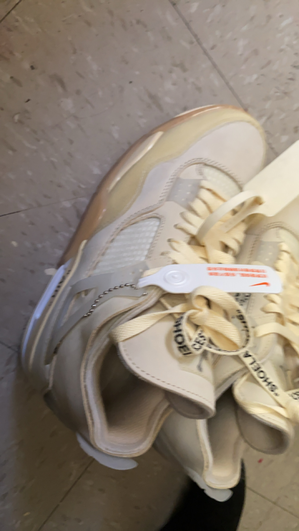 EM Sneakers Jordan 4 Retro × Off-White Sail review 0