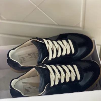 EM Sneakers Maison Margiela Replica low-top leather sneakers Black review Nee Willis