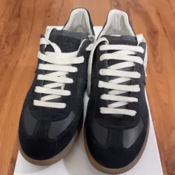 EM Sneakers Maison Margiela Replica low-top leather sneakers Black review Ryan Hoilette
